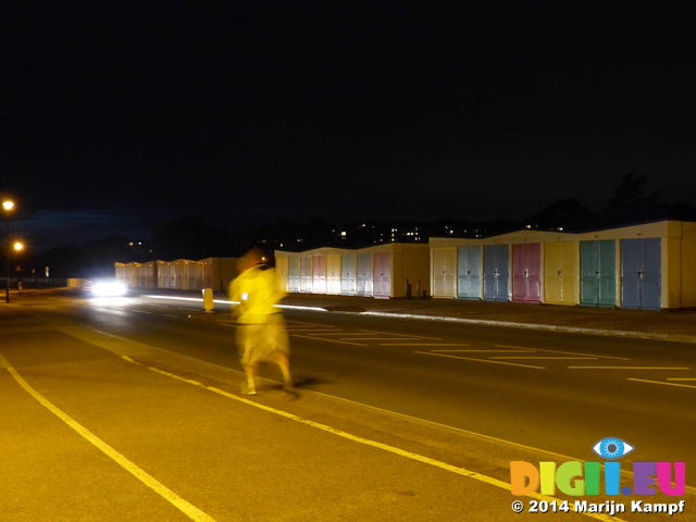 FZ010497 Row of beach huts at night